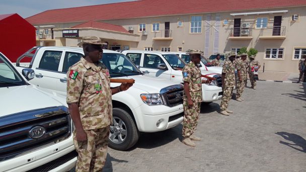 PHOTO NEWS: Governor Shettima rewards five soldiers with Hilux Vans