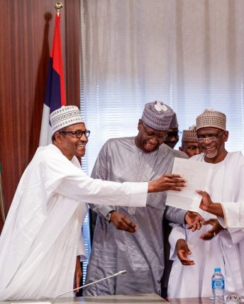 President Buhari finally presented with his WASC result
