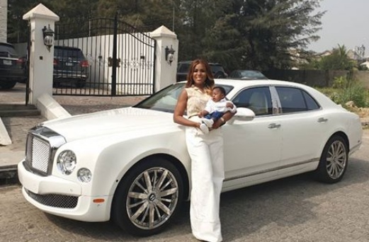 Linda Ikeji shares adorable photo of son and his Bentley Mulsanne