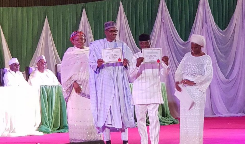 Buhari receives his certificate of return from INEC