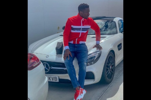 Eagles defender Kenneth Omeruo shows off his Mercedes Benz