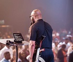 Abuja Pastor Uche Aigbe Storms Church With AK-47