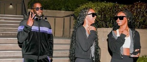 Embattled Music Mogul Diddy Steps Out With His Twin Daughters Flashes Peace Sign To Paparazzi
