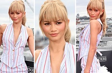 Zendaya Flaunts Figure In A Plunging Striped Waistcoat