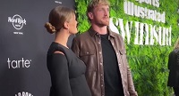 Logan Paul's Fiancée Nina Agdal Debuts Baby Bump at SI Swimsuit Launch Party