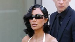 Kim Kardashian Gets Caught Googling Herself On Her Phone In Paris
